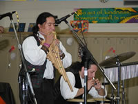 Playing their bamboo fultes