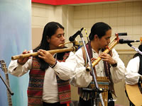 Luis and Jorge playing their melodic flutes