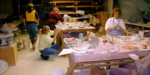 Members of the Seldovia Potters' Guild at work in the pottery studio